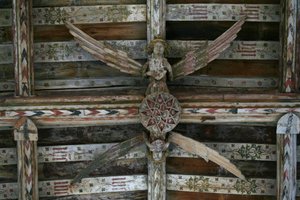 View of one of the carved wooden angels in the nave by English School