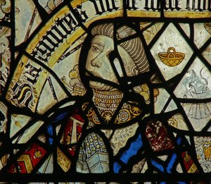 Detail from a window depicting the donor (detail) by English School