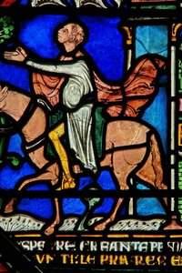 Detail from the Miracle Window depicting a knight riding out of the city cured