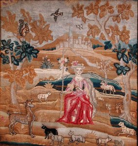 Embroidered panel depicting a shepherdess in front of a village
