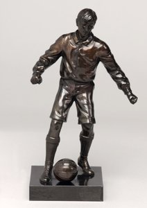 Footballer, part of a clock set by English School
