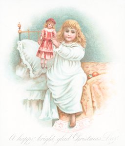 Girl getting out of bed on Christmas morning with present
