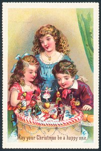 Lady and Children Admiring Christmas Cake