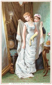 Maid assisting lady to dress