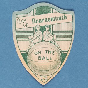 Play Up Bournemouth, Baines Card in the Shape of a Shield and Two Footballers Sitting on Top of a Large Football, 1888-89 by English School