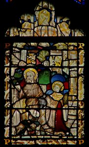 The east window depicting St Francis receives the stigmata; angel musicians in the canopy