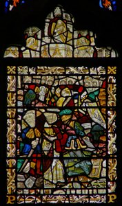 The east window depicting St John on Patmos; angel musicians in the canopy