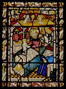 The east window depicting the Nativity by English School