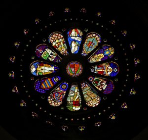 The west rose window with various reset panels (rose window - internal)