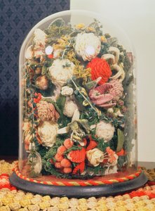 Victorian woollen flowers in a glass case