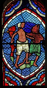 Window depicting a scene from the Prodigal Son story: he is led astray by English School
