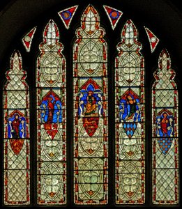 Window Ew depicting the Crucifixion and St Mary, St John, St Mary Magdalene and St Margaret by English School