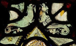 Window depicting grotesques by English School