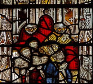 Window depicting St Martin kneels at an altar