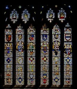 Window St Nectan Chapel Sw depicting angels with shields of arms; reset angels, heads and roundels. the four Evangelists symbols by English School