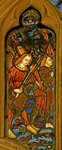 Window depicting musician angels, one with a monochord