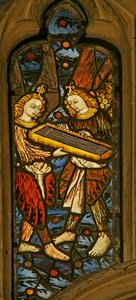 Window depicting musician angels with a clavichord