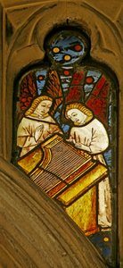 Window depicting musician angels with a clavicymbal