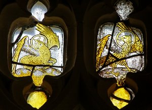 Window depicting Evangelists symbols - St Luke