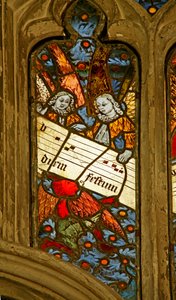 Window depicting the angelic choir with musical score
