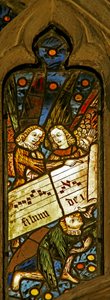 Window depicting the angelic choir with musical score