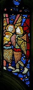 Window depicting musician angels, one with a lute