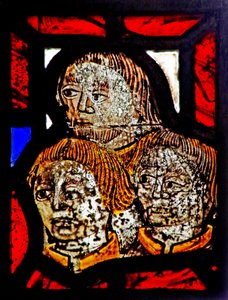 Window s6 depicting a reset fragment with three heads