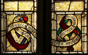 Window depicting Tubbe family motto by English School