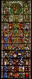 Window w42 depicting St Catherine being tortured: above is a royal coat of arms by English School