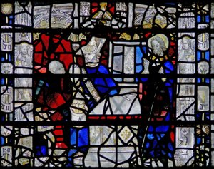Window depicting a scene from the life of St Nicholas; border with figures by English School