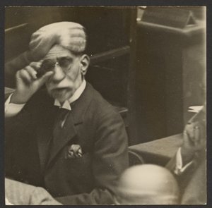 Seated Man in Turban and Dark Glasses