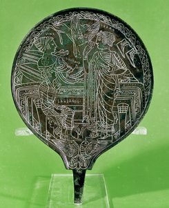 Mirror depicting Aphrodite persuading Helen to follow Paris to Troy, from Palestrina