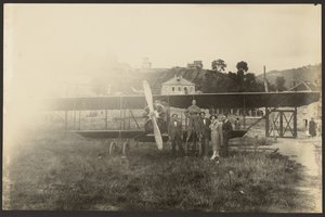 Group Portrait in Front of Airplane