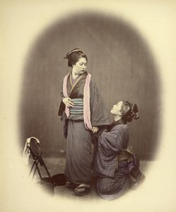 Putting on the Obi, or Girdle by Felice Beato