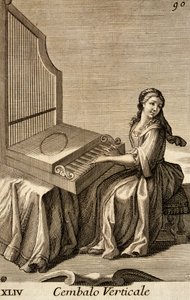 Woman playing the vertical harpsichord