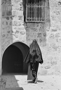 Religious in a Street of the Old City of Jerusalem by Fosco Maraini
