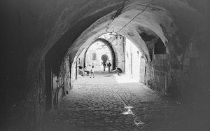Road in the souks of the Old City of Jerusalem by Fosco Maraini