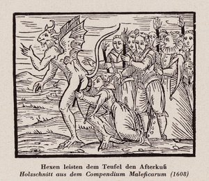 Witches kissing the devil