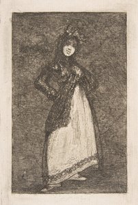 A Maja standing against a dark background