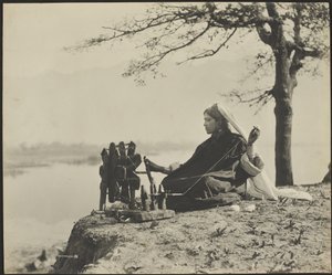 A Kashmiri (Mahomedan) spinning by Fred Bremner