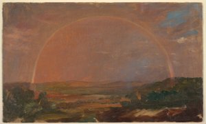Rainbow over a Hilly Landscape