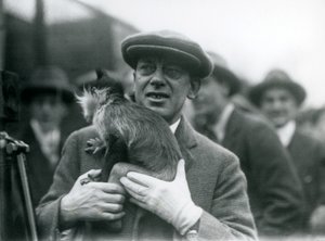 A Black-Crested Mangabey, Possibly Freckles, with His Handler, Taking Part in an Outside Broadcast from London Zoo, 1925 by Frederick William Bond