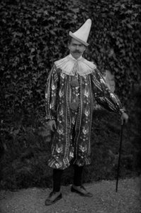 A Man Posing in a Clown Costume by French Photographer