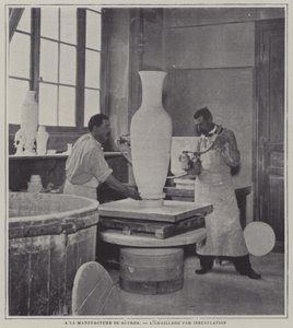 Spray Enamelling a Vase at the Sevres Porcelain Factory, France by French Photographer