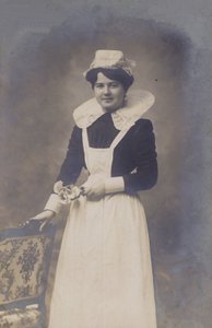 Young Girl, Maid (?), Holding a Small Bunch of Flowers