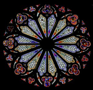 A late 13th century rose window with some original glass