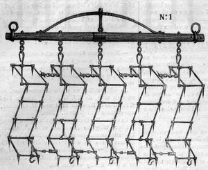 Agricultural machine: an articulee harrow.