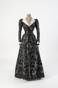 Black Figured Silk Dress with High Neck Chemisette of Cream Lace, Early 1890s by French School