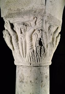 Column capital with a man with raised arms