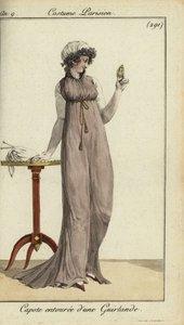 Fashionable woman looking at a locket by French School